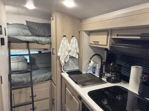 Fridge, microwave, stovetop, coffee/tea maker