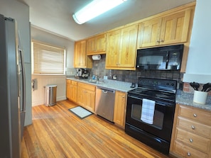 Fridge, microwave, oven, stovetop - Cozy Craftsman Home Close to UW and Downtown (Laramie)