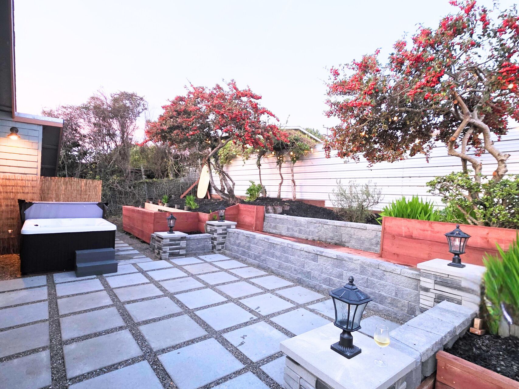 Relax and unwind with a glass of wine in the new hot tub.