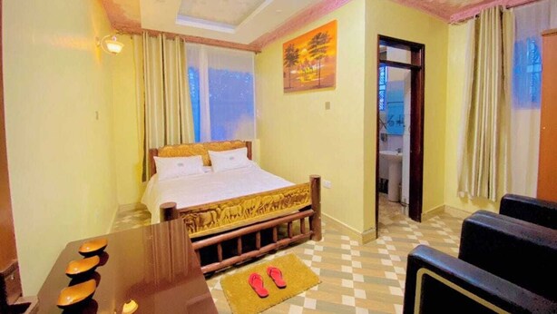 Desk, laptop workspace, blackout drapes, iron/ironing board (on request) - Trinity Resort Hotel and Spa (Kampala)