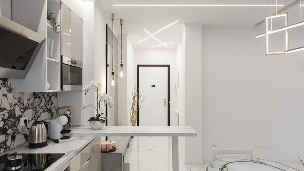 A modern kitchen with white cabinetry, a marble backsplash, and a central island.