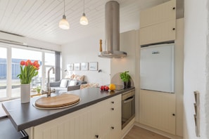 Appartement, animaux de compagnie interdits | Cuisine privée | Réfrigérateur, four, plaque de cuisson, chaise haute