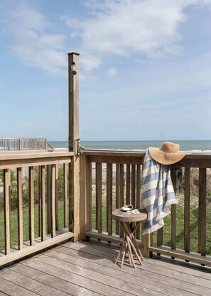 Property grounds - Oceanfront 7-bed home with grass backyard & grill (Folly Beach)