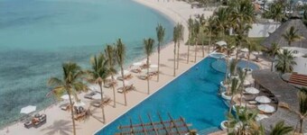 Exclusive Access to 2 Beach Clubs and Golf Cart