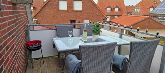 Apartment Lüttje Amselnüst - central location directly on the dike with balcony