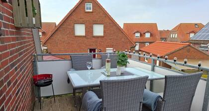 FeWo Lüttje Amselnüst - zentrale Lage direkt am Deich mit Balkon