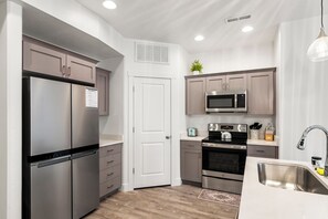 Fridge, microwave, oven, stovetop - Blue Bear Lake Townhome (Garden City)