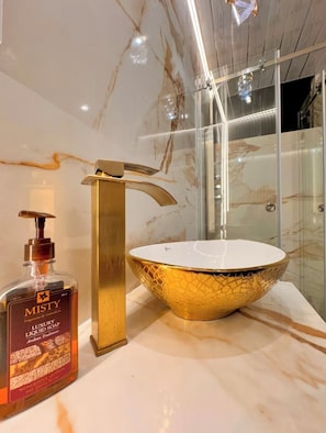 Jetted tub, hair dryer, towels, soap