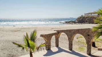On the beach, sun loungers