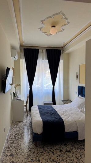 4 عدّة غرف نوم ومكواة/لوح كي وواي فاي وملاءات أسرّة