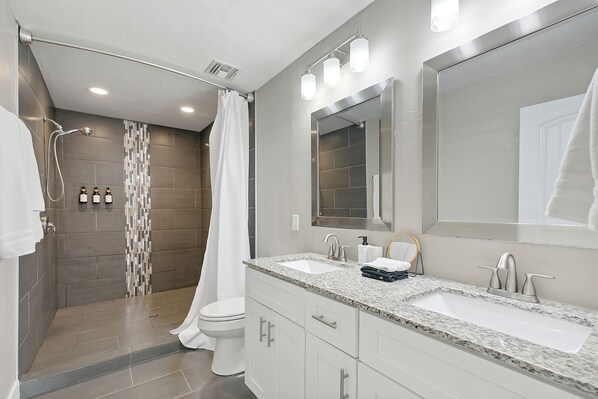 Hair dryer, towels, soap, shampoo