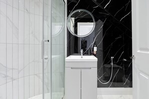 Shower, eco-friendly toiletries, hair dryer, bidet