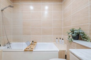 Eco-friendly toiletries, hair dryer, bidet, towels