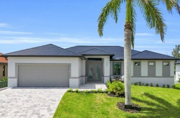 Exterior - Brand New Waterfront Retreat 5 min to Beach - Pool, Dock & Bay Views - 4BR/3BA (Bonita Springs)