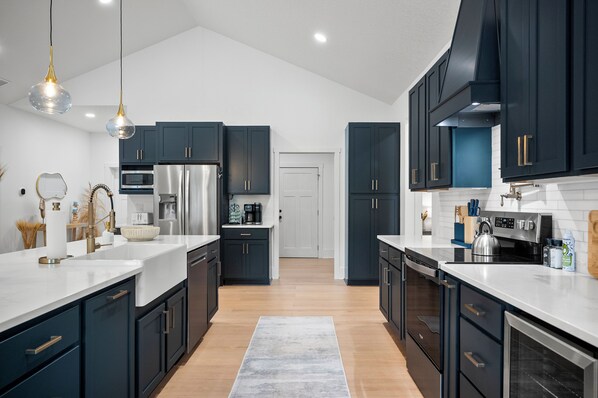 Fridge, microwave, oven, stovetop - Luxury Waterfront Escape – Private Dock, Heated Pool & Game Room! Pet-Friendly! (Palm Coast)