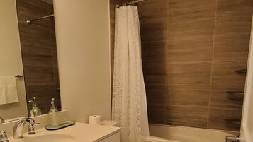 Hair dryer, towels, soap, shampoo
