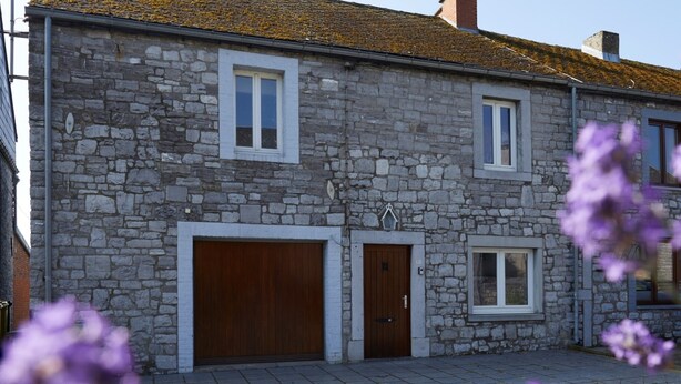 A stone building with two wooden doors and windows, a small porch, and a tiled ground. - The "Smoking Fox". Between the Meuse and Molignée rivers, relaxation and leisure! (Onhaye)