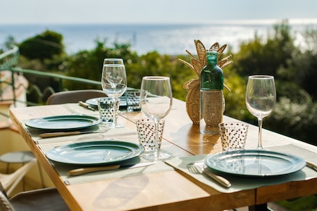 Outdoor dining. Mediterranean Escape Between the Sea and the Esterel Mountains