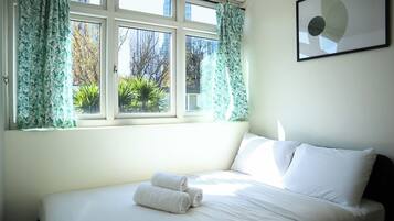 4 bedrooms, desk, iron/ironing board, travel crib