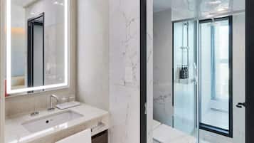 Shower, hair dryer, slippers, towels