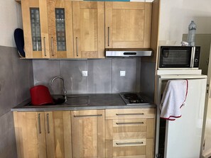 Fridge, microwave, cookware/dishes/utensils