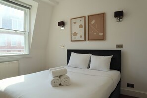 2 bedrooms, desk, iron/ironing board, travel cot