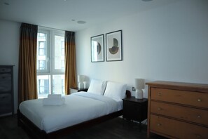2 bedrooms, desk, iron/ironing board, travel crib