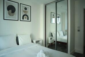 2 bedrooms, desk, iron/ironing board, travel crib