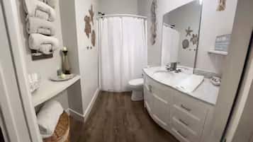 Hair dryer, towels, soap, shampoo
