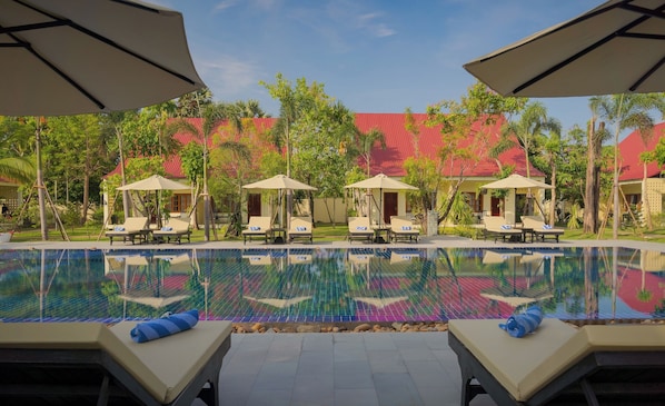 Outdoor pool, open 7:00 AM to 9:00 PM, pool umbrellas, sun loungers