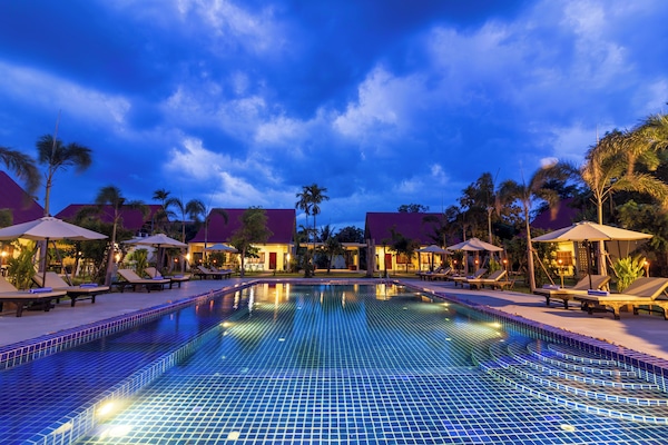 Outdoor pool, open 7:00 AM to 9:00 PM, pool umbrellas, sun loungers