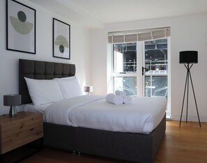 1 bedroom, desk, iron/ironing board, travel cot