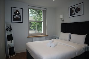2 bedrooms, desk, iron/ironing board, travel cot