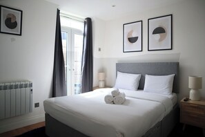 1 bedroom, desk, iron/ironing board, travel cot