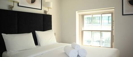 1 bedroom, desk, iron/ironing board, travel cot