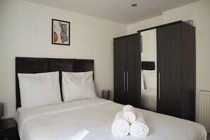 2 bedrooms, desk, iron/ironing board, travel cot