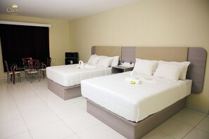 Comfort Quadruple Room, Balcony, Pool View | In-room safe, blackout drapes, soundproofing, iron/ironing board - CROWN HOTEL TOBAGO (Crown Point)