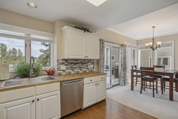 Fridge, microwave, dishwasher, coffee/tea maker - Birdie's Nest: Pet friendly, uptown getaway w/ fenced wooded yard, near golf course, poker table. (Pagosa Springs)