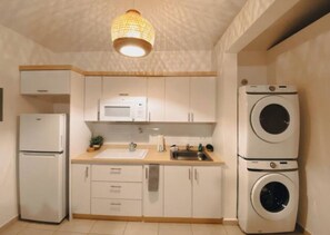 Fridge, microwave, stovetop, coffee/tea maker