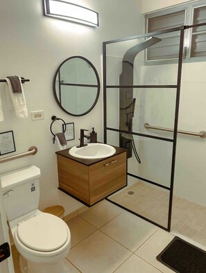 Shower, hair dryer, towels, soap