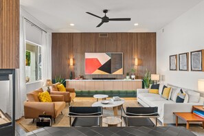 Smart TV, fireplace, books, stereo