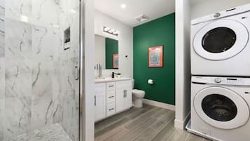 Eco-friendly toiletries, hair dryer, towels
