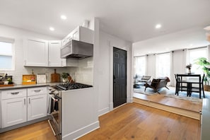 Fridge, microwave, oven, stovetop - ★HostWise Stays★ Stylish War Streets Retreat | Easy Walk to Stadiums & Dining (Pittsburgh)