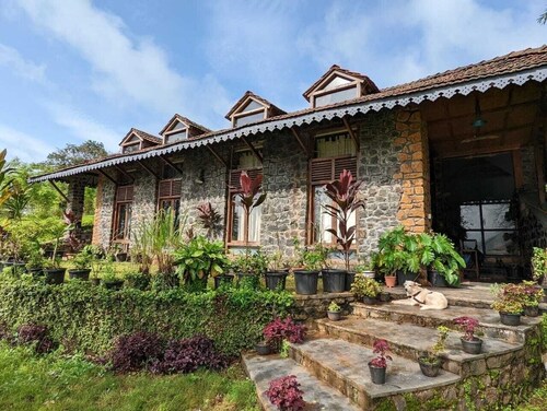 Experience remote stone cottage part of farm stay by the lake amidst raw nature.