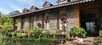 Experience remote stone cottage part of farm stay by the lake amidst raw nature.