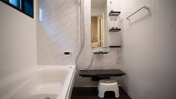 Superior Double Room, Non Smoking | Bathroom | Separate tub and shower, hair dryer, slippers, towels
