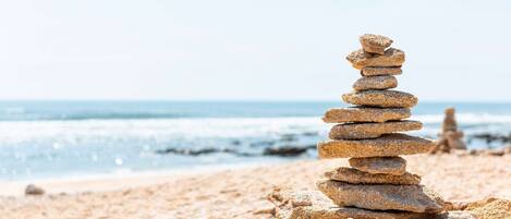 On the beach, beach towels, kayaking, fishing