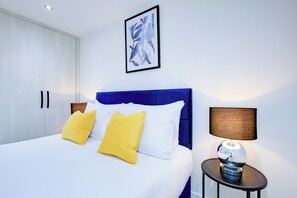1 bedroom, desk, iron/ironing board, travel cot
