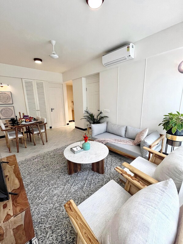 Apartamento Deluxe | Zona de estar