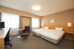 Down comforters, desk, laptop workspace, blackout drapes